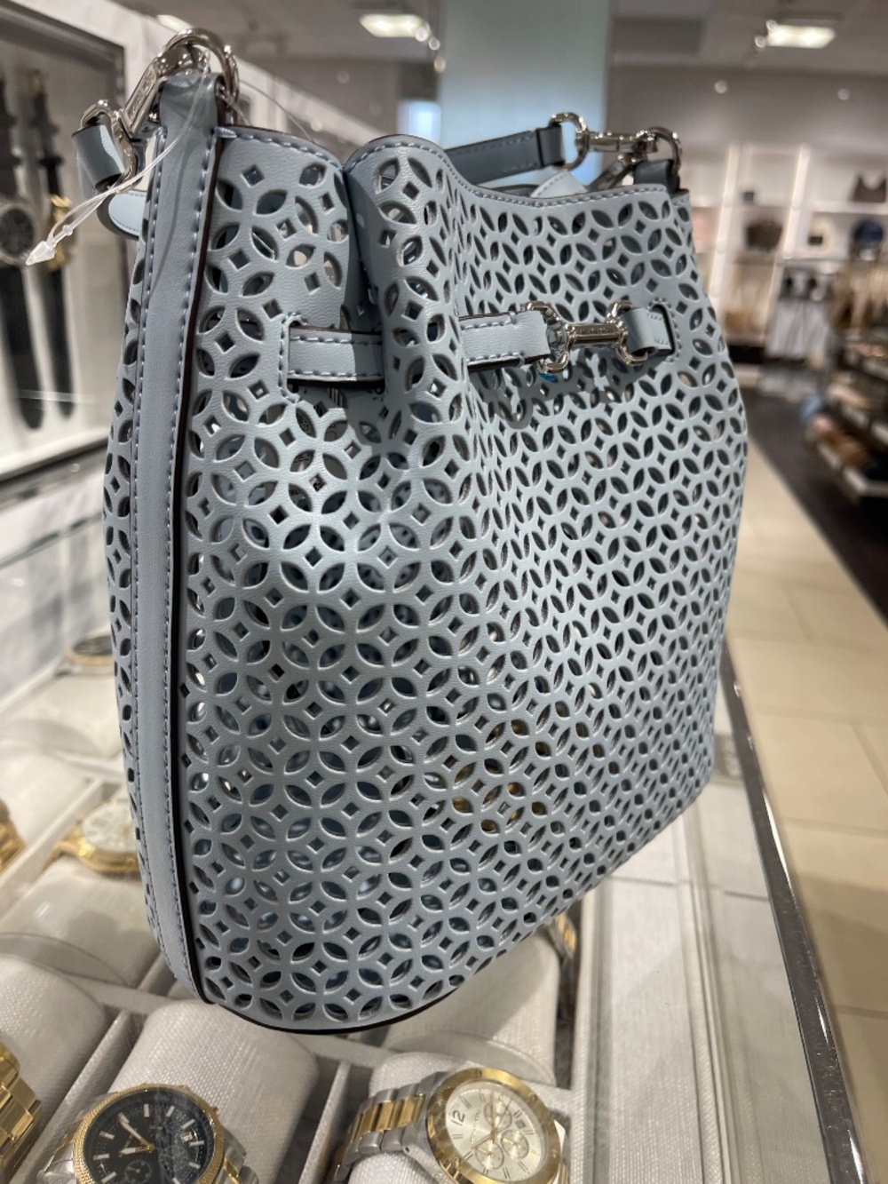 Carson Small Floral Laser Cut Bucket Crossbody Bag - Picture 11 of 16